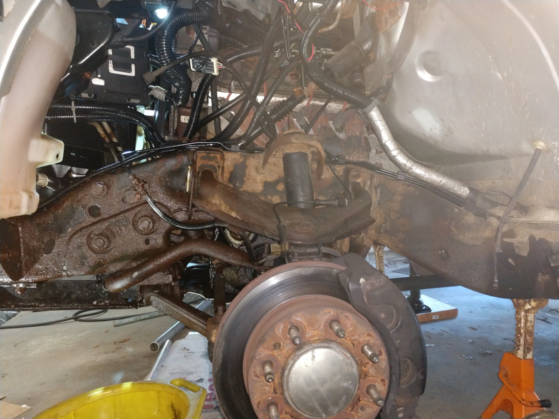 those three big bolts in the frame hold the box on